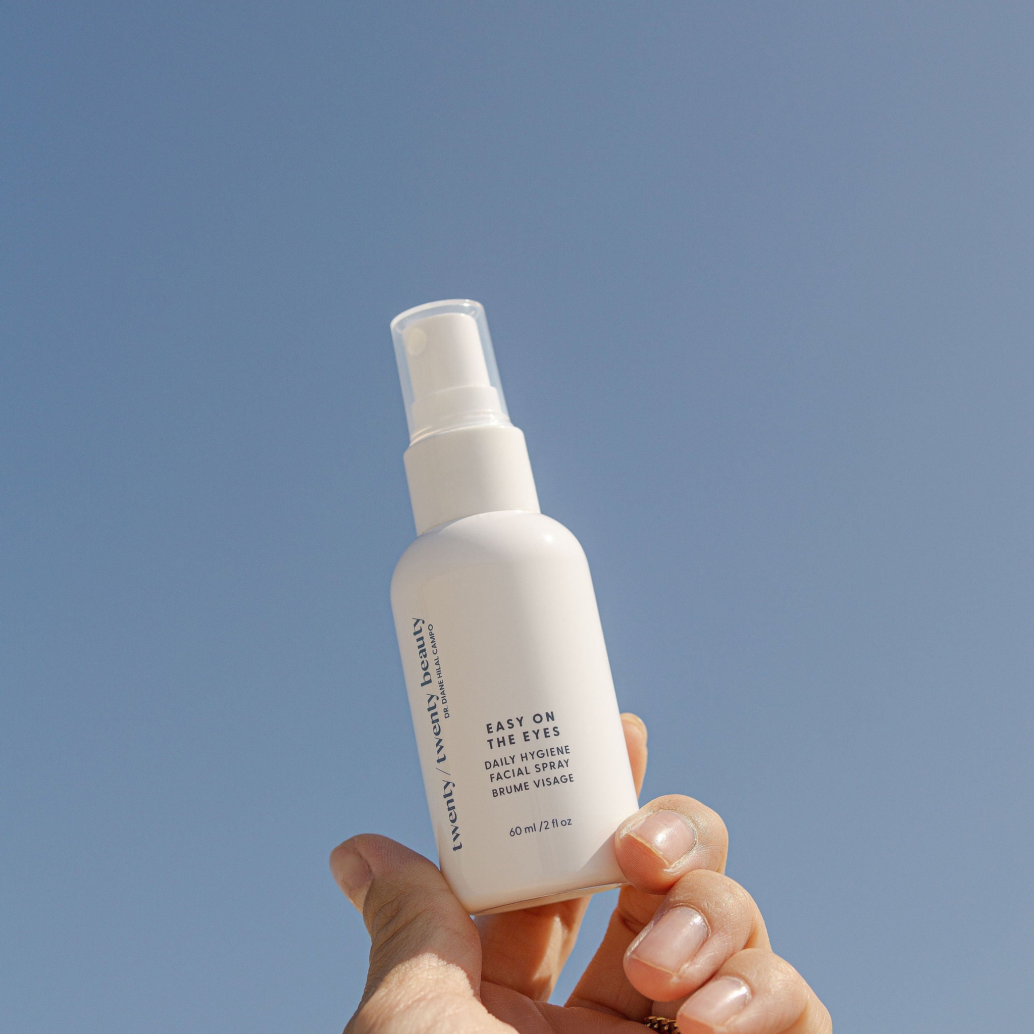 Hand holding twenty/twenty beauty Easy on the Eyes