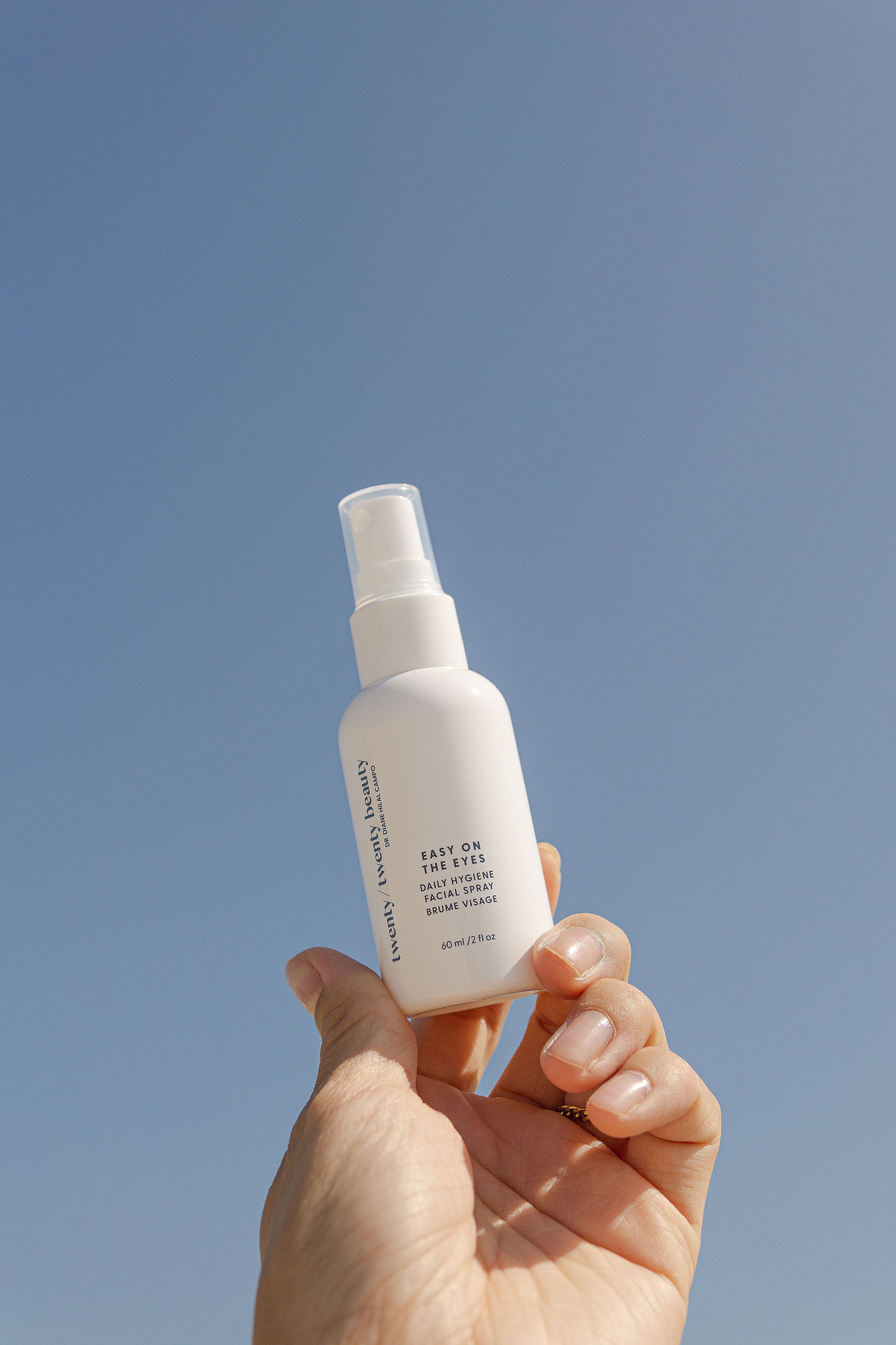 Hand holding twenty/twenty beauty Easy on the Eyes